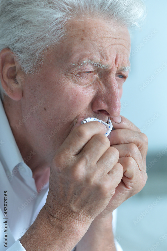 Portrait of sad sick senior man Portrait of sad sick senior man