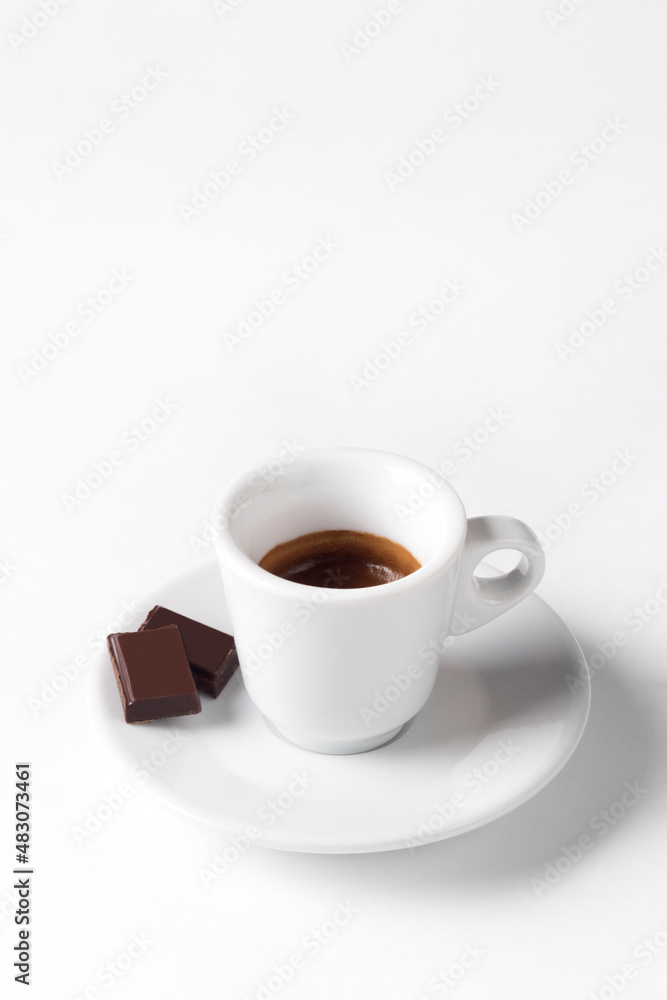 white coffee cup with chocolate on white background, Cup of espresso. white coffee cup with chocolate on white background, Cup of espresso.