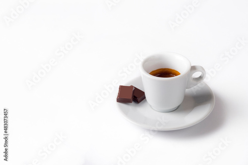Coffee cup with chocolate on a white background.Cup of espresso.