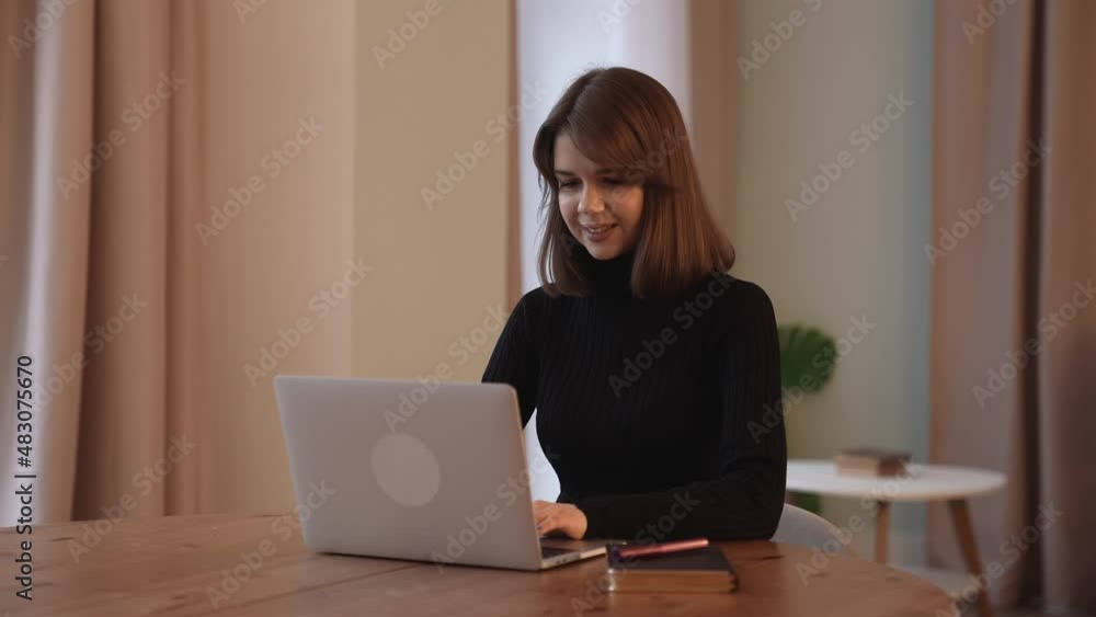 A freelance woman uses a laptop, a workplace at home. A freelance woman uses a laptop, a workplace at home.