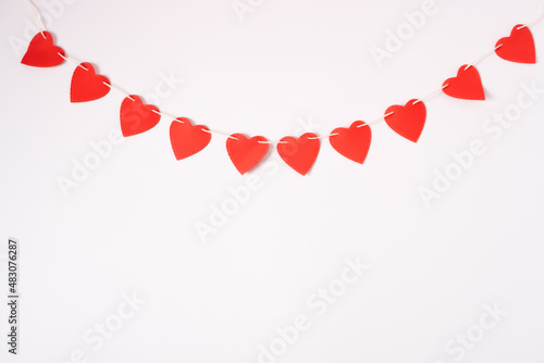 Red hearts garland, seamless border.