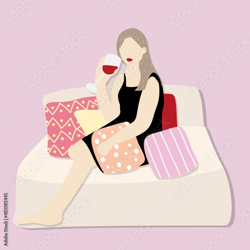 部屋で　くつろいで　ワインを飲んでいる　女性	