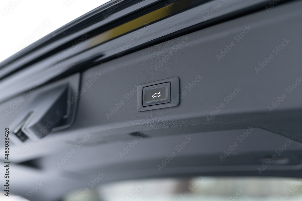 trunk control button in the car interior trunk control button in the car interior