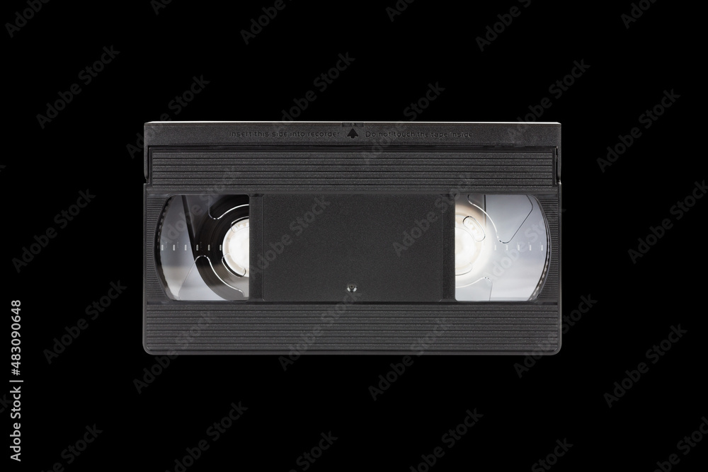 VHS videotape is isolated on a black background front view