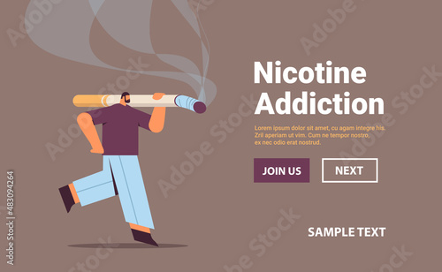 man carrying huge cigarette bad habits unhealthy lifestyle nicotine addiction no smoking concept