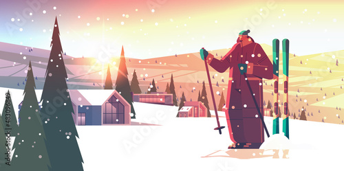 skier woman sportswoman skiing doing activities winter vacation concept sunset snowfall landscape background