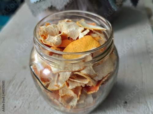 Homemade candied orange peel after the drying process. Dry orange peels in a ja