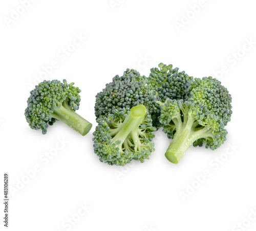 Fresh broccoli with drops isolated on white background