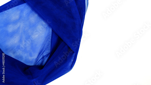 The part of crumpled blue tulle on white background. copy space