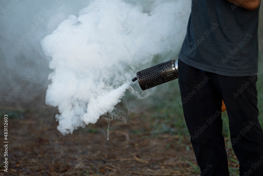 Obraz premium smoke machine for Anti mosquitoes, Measures to get rid of mosquitoes in the community