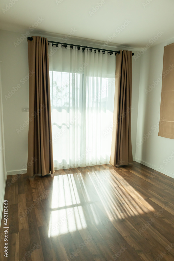 Obraz premium Curtain window interior decoration in living room on sunny day with sunlight