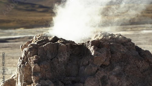 Pequeño Volcán en erupción en los Geisers del Tatio, Atacama al norte de Chile photo