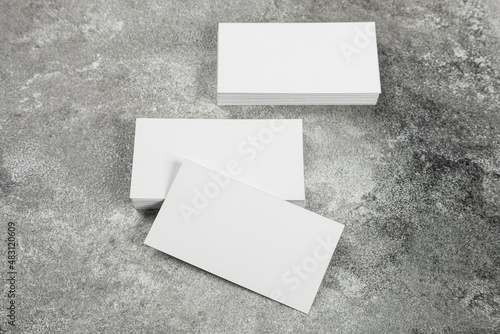 stack of business cards blank mockup on grunge background mocap for design