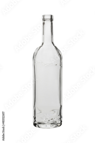 Transparent glass bottle. Isolated on a white background, close-up