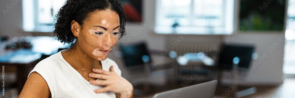 Attractive middle aged woman using laptop computer Attractive middle aged woman using laptop computer