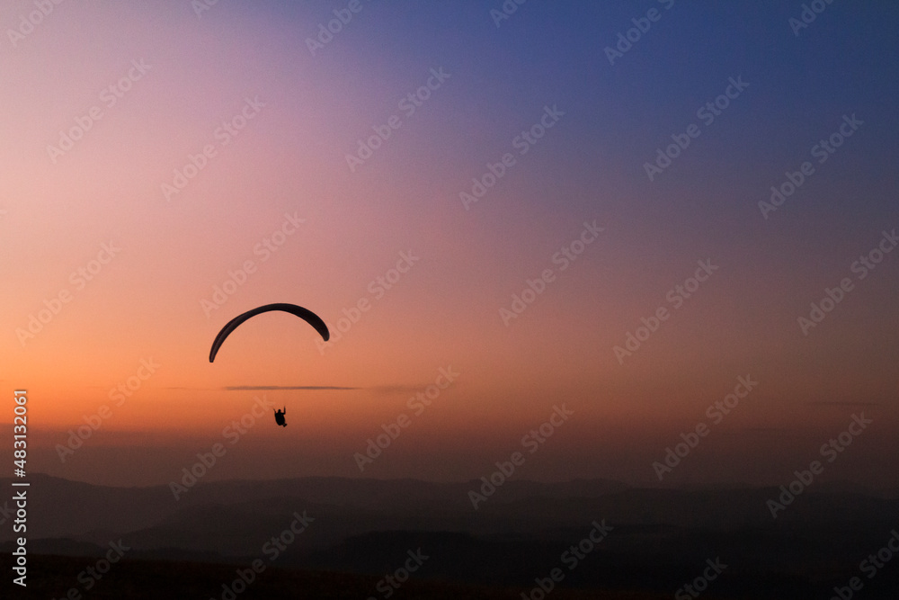 Pico do Gavião, Andradas, Minas Gerais, Brazil: sunset at the top of mantiqueira mountain with paraglaider flight Pico do Gavião, Andradas, Minas Gerais, Brazil: sunset at the top of mantiqueira mountain with paraglaider flight