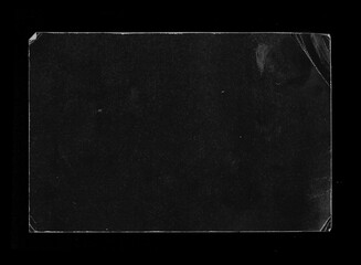 Old Black Empty Aged Damaged Paper Cardboard Photo Card Isolated on Black. Real Halftone Scan. Folded Edges. Rough Grunge Shabby Scratched Torn Ripped Texture. Distressed Overlay Surface for Collage. 