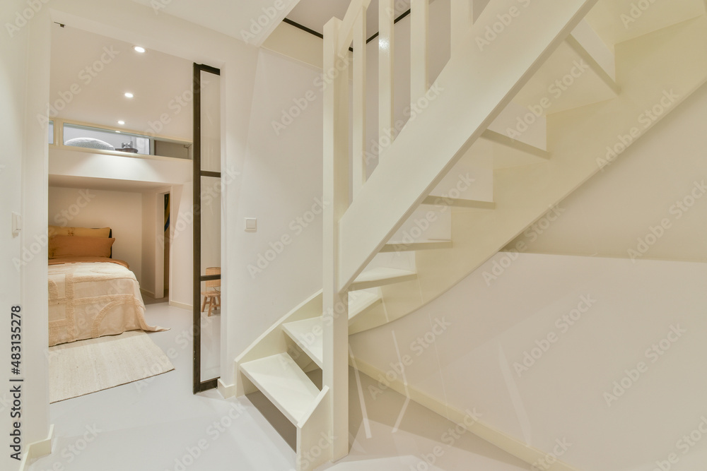 Interior of bedroom with staircase Interior of bedroom with staircase