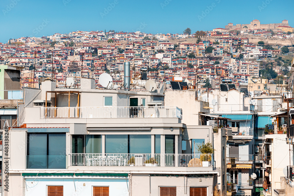 Houses and apartments in Thessaloniki with a pile of residential blocks create a chaos of slums. Real estate and urban development concept