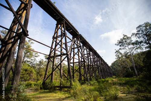 Fotografie, Obraz Wooden trestle bridge across a valley in Australia
