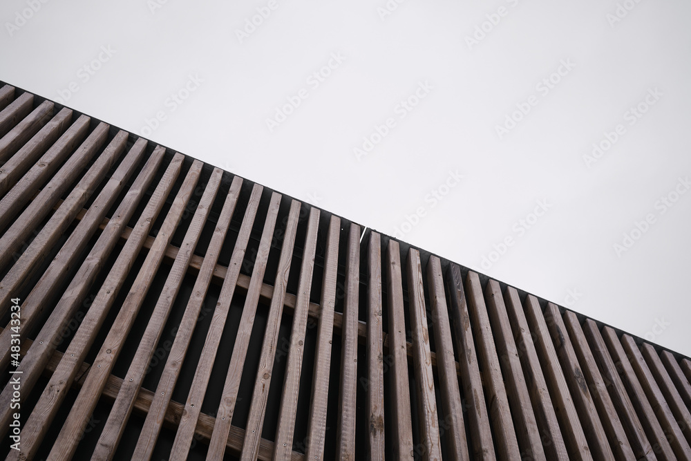 Wooden space with diagonal stripes. Abstraction. Space for text. Background and texture of lines Wooden space with diagonal stripes. Abstraction. Space for text. Background and texture of lines