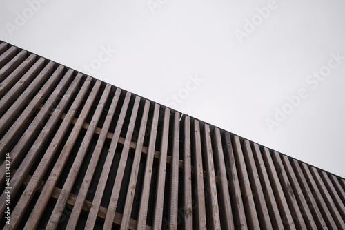 Wooden space with diagonal stripes. Abstraction. Space for text. Background and texture of lines