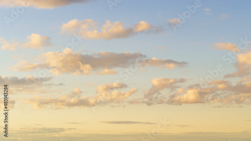 sunlit twilight sky with clouds