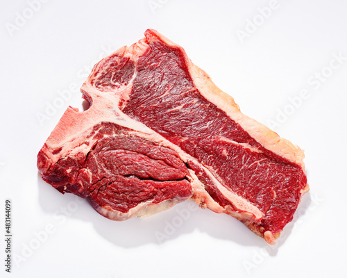 raw porterhouse beef steak on a white background