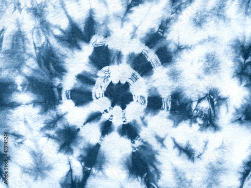 Tie dye shibori pattern. Abstract tie-dye technique hand dyed fabric.
