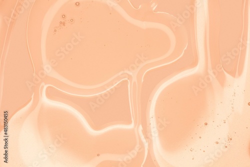 Cream gel pink transparent cosmetic sample texture with bubbles isolated on white background