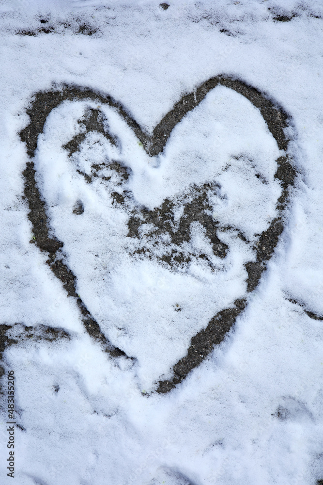a heart shape in snow