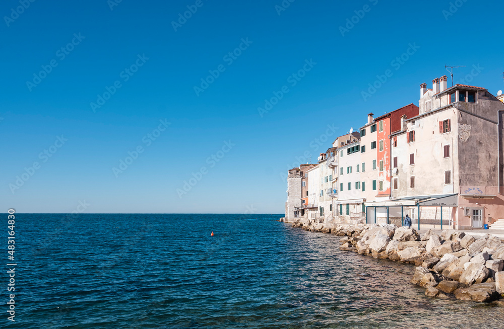 Beautiful, coastal town of Rovinj, Croatia famous for its colorful houses built right above the adriatic sea on the rocky shore