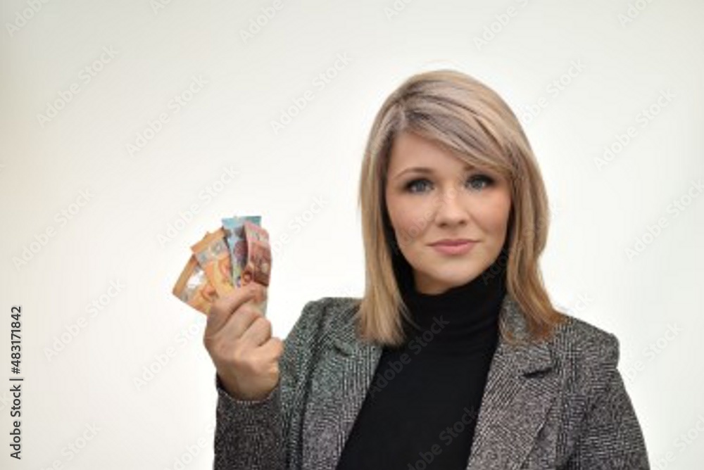 young woman with long straight hair holding euro banknotes in her hand young woman with long straight hair holding euro banknotes in her hand