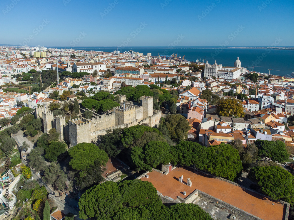 Aerial view of the Alfama historical district and the Saint-Georges castle in  Lisbon, Portugal capital city, on a sunny day