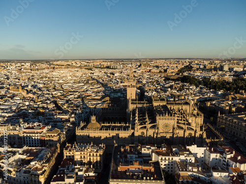 Dramatic aeria view of the Sevilla cathedral in Seville old town with it famous Giralda bell town in Andalucia in Spain