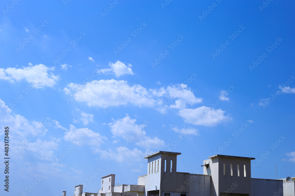 Blue sky background with tiny clouds. Summer blue sky cloud, beautiful clear cloudy in sunshine