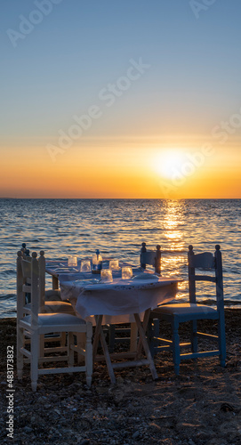 Tranquil scene of beautiful sea at sunset. Orange and yellow sunset on the sea. Aerial panoramic view of sunset over sea.