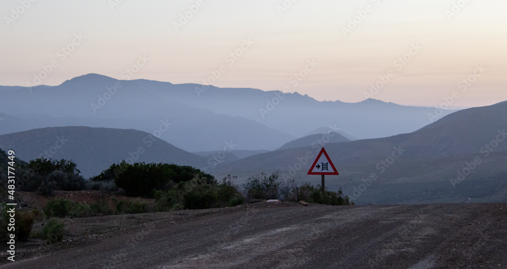 A valley of hills fade into the sunrise in Vleiland in the Central Karoo in the Western Cape province of South Africa