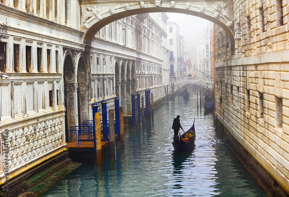 Romantic Venetian canals. Old Venice. Gondolas and Bridge of sights. Italy travel and landmarks