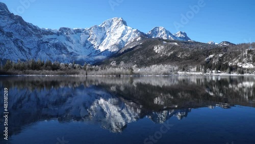 Wallpaper Mural Dreamlike Winter wonderland in Almtal, Salzkammergut. Frozen Trees, snowcaped mountains, crystal clear Almsee, Totes Gebirge, Upper Austria Torontodigital.ca