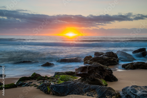 Soft sunrise seascape with clouds