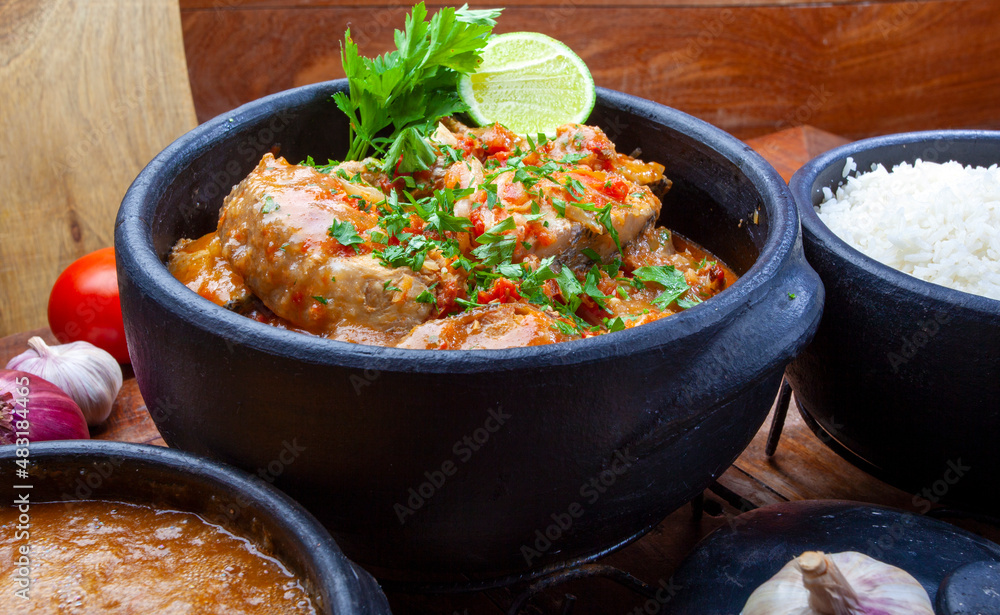 Moqueca fish and shrimp, traditional dish of Brazilian cuisine Moqueca fish and shrimp, traditional dish of Brazilian cuisine