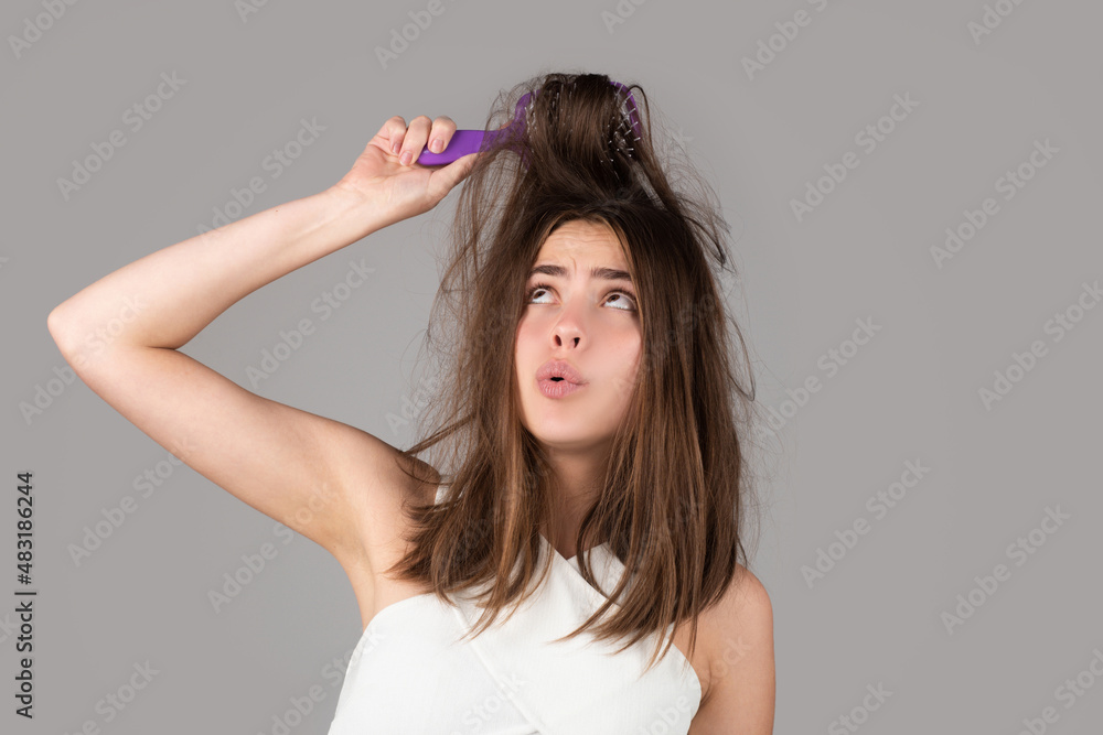 Woman with hair problem. Woman is looking shocked to her lost hair. Head bald and hair treatment concept. Woman with hair problem. Woman is looking shocked to her lost hair. Head bald and hair treatment concept.