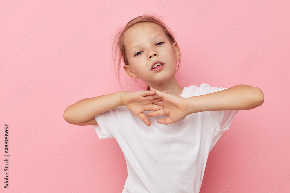 Portrait of happy smiling child girl in a white t-shirt smile childhood unaltered Portrait of happy smiling child girl in a white t-shirt smile childhood unaltered