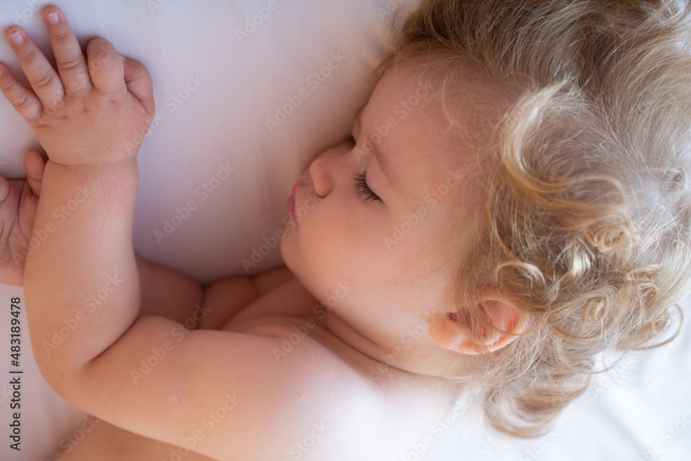 Baby sleeping in the bed. Kids sleepy face, child sleep. Close up face. Baby sleeping in the bed. Kids sleepy face, child sleep. Close up face.