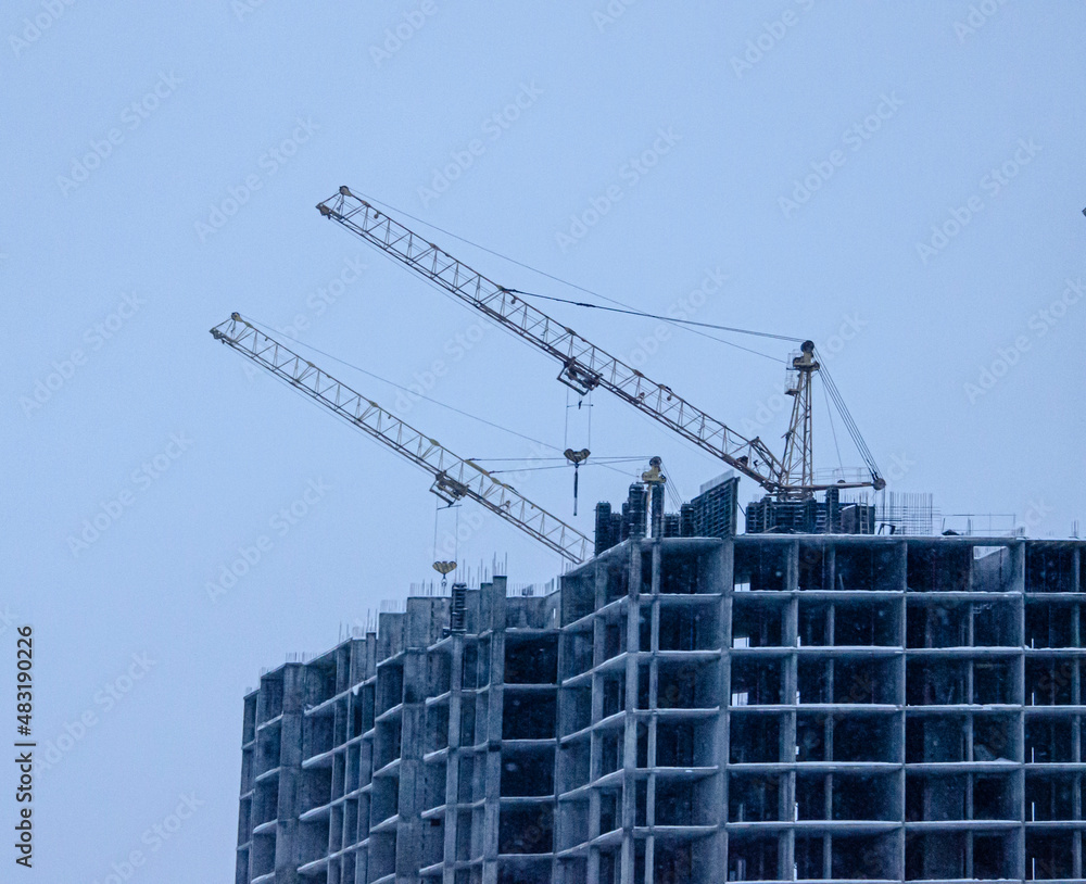 tower cranes at construction site
