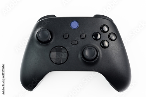 Next generation black game controller isolated on white background.