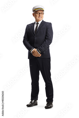 фотографія Full length portrait of a pilot in a uniform posing