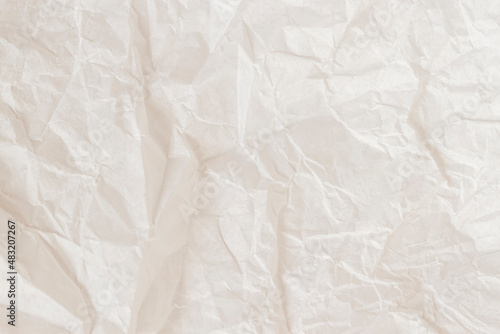 Crumpled paper texture, light cream color, background