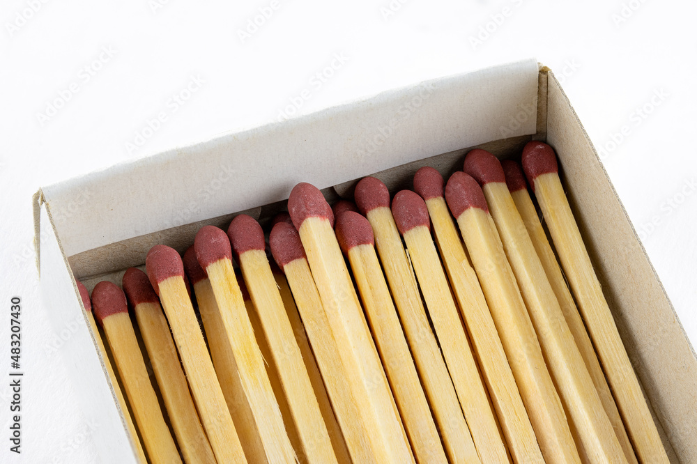 Match sticks in a box on white background Match sticks in a box on white background